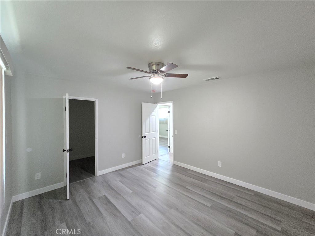 775 Libby Drive Riverside, CA 92507 - Photo 26 of 28 a view of an empty room with wooden floor