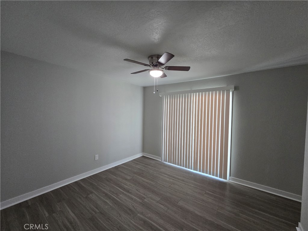 775 Libby Drive Riverside, CA 92507 - Photo 7 of 28 a view of an empty room with wooden floor