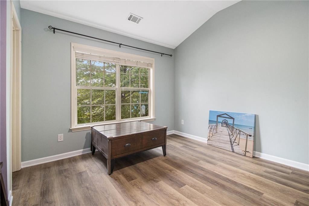 218 Third Avenue Avondale Estates, GA 30002 - Photo 24 of 26 a room with a window and a table chair
