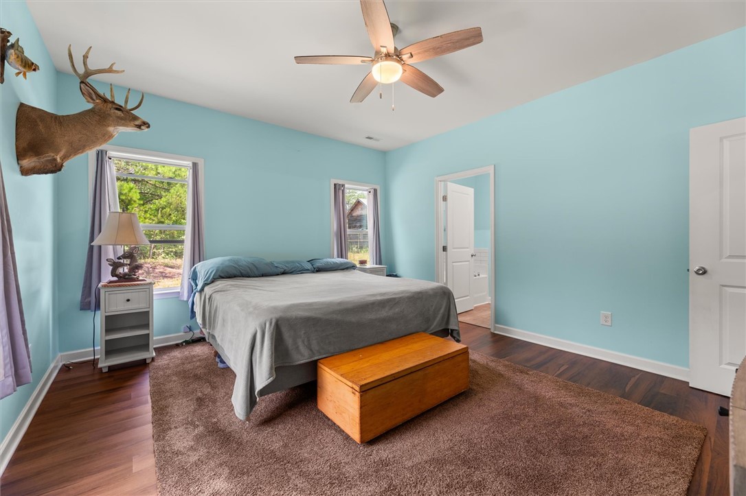 67 Sawblade Ridge Marietta, SC 29661 - Photo 15 of 37 This spacious bedroom offers comfortable living with elegant flooring and a calming atmosphere.