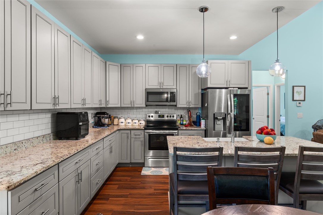 67 Sawblade Ridge Marietta, SC 29661 - Photo 3 of 37 Bright and inviting kitchen with ample counter space, perfect for culinary endeavors and gatherings.