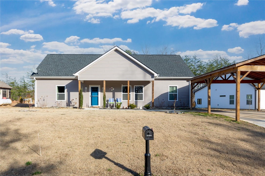 67 Sawblade Ridge Marietta, SC 29661 - Photo 33 of 37 This charming residence features a welcoming porch, perfect for outdoor enjoyment.
