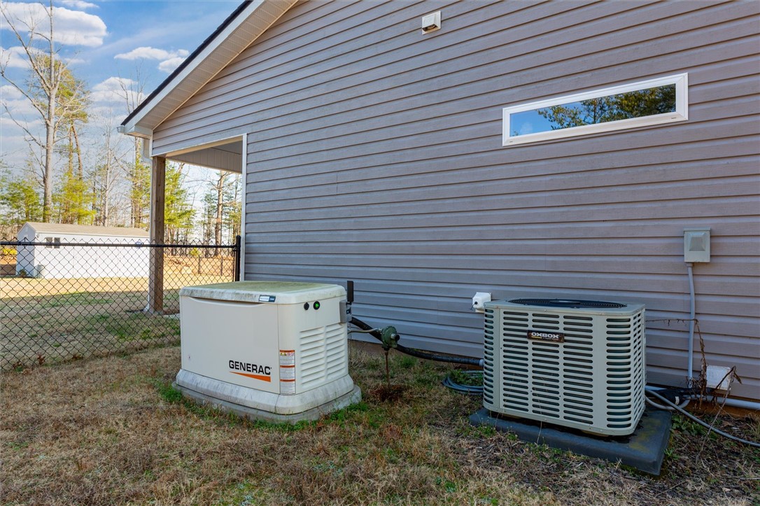 67 Sawblade Ridge Marietta, SC 29661 - Photo 34 of 37 This house features a dependable whole-house generator and efficient cooling system.