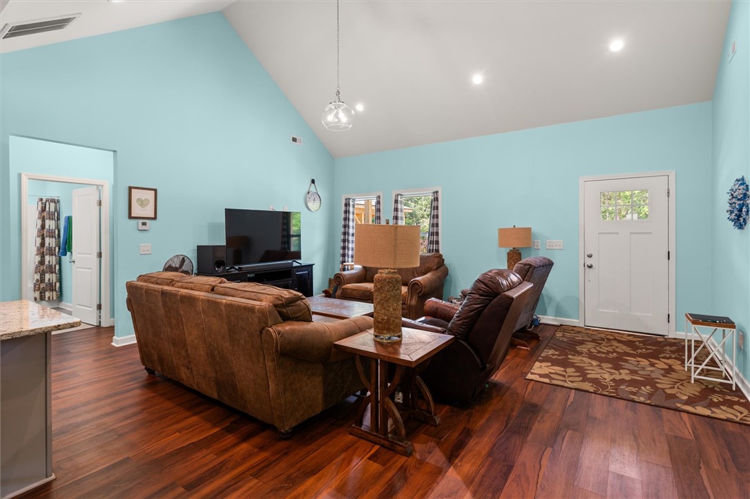 67 Sawblade Ridge Marietta, SC 29661 - Photo 9 of 37 This living room features rich wood flooring and abundant natural light.