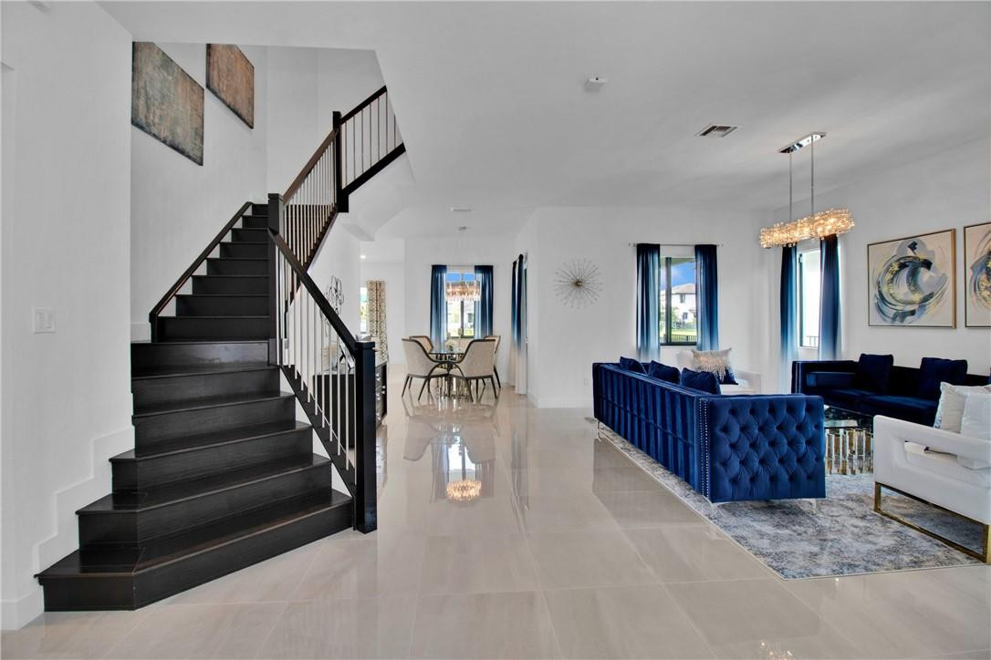 Undisclosed Address Parkland, FL 33076 - Photo 2 of 53 Entryway with Grand Staircase