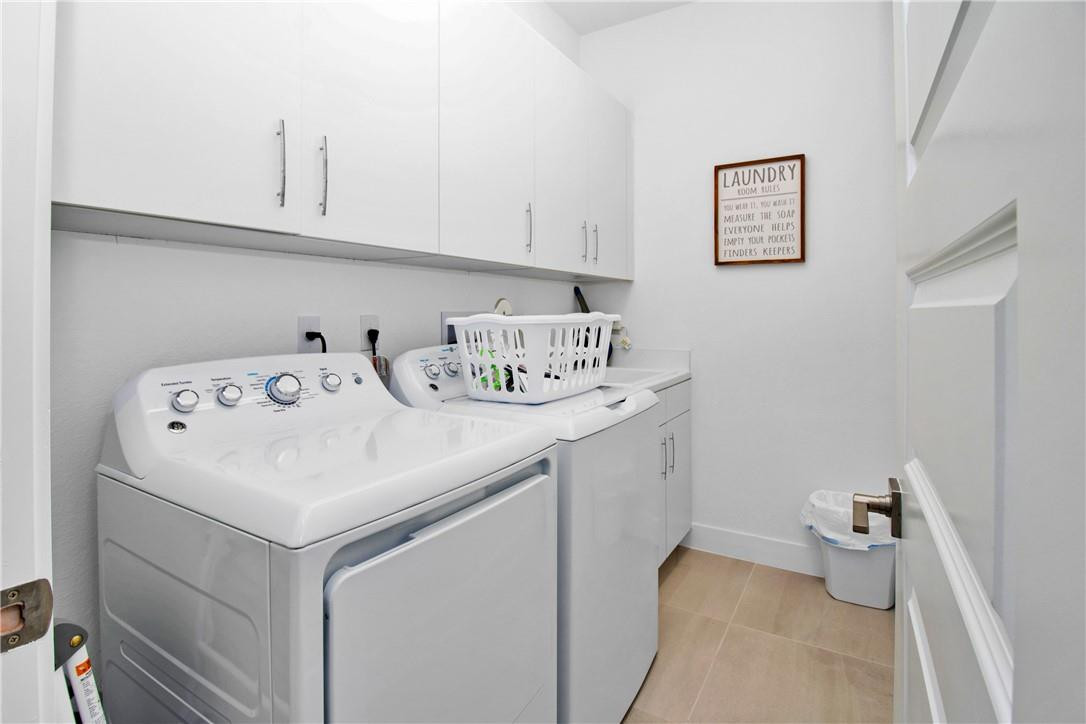 Undisclosed Address Parkland, FL 33076 - Photo 21 of 53 Upstairs Laundry Room