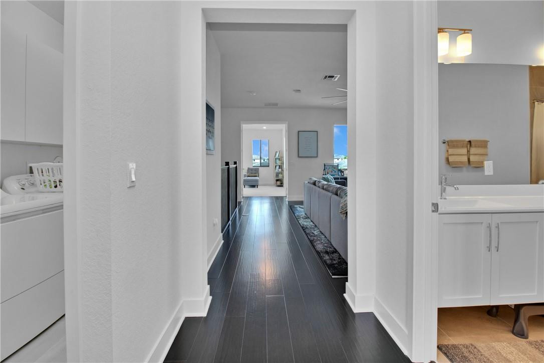 Undisclosed Address Parkland, FL 33076 - Photo 22 of 53 Long Hallway splitting bedrooms