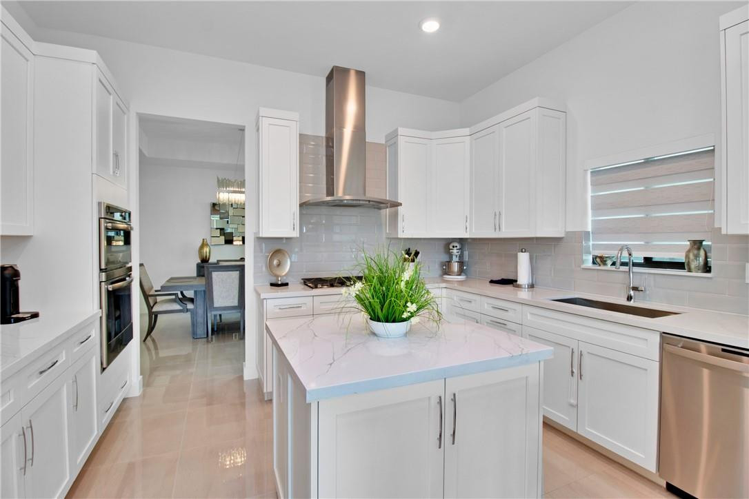Undisclosed Address Parkland, FL 33076 - Photo 9 of 53 Kitchen with Gas Stove