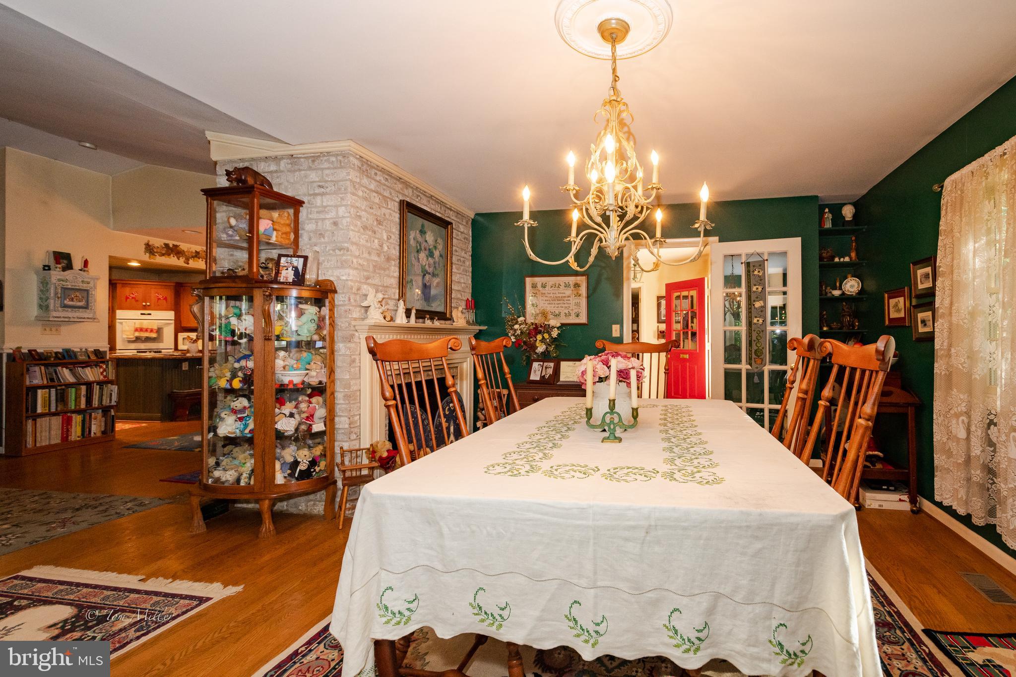 2744 Greene Road Baldwin, MD 21013 - Photo 8 of 32 Dining Room with Fireplace and Hardwood Floors