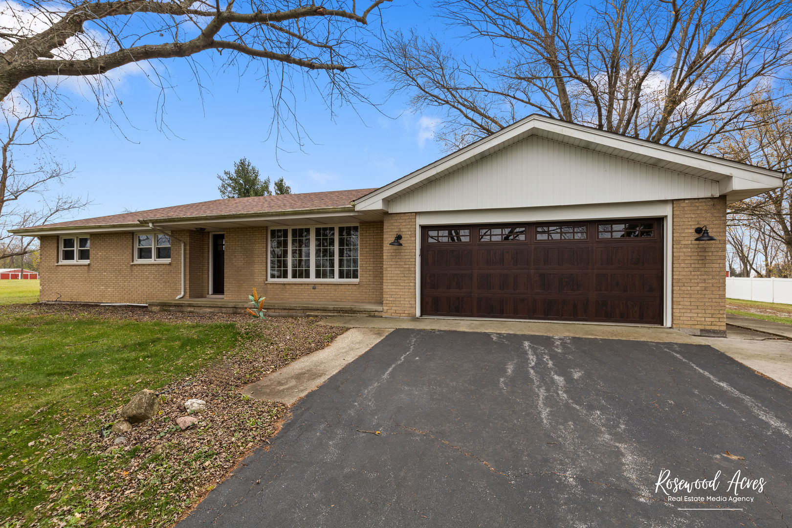 2565 East Offner Road Beecher, IL 60401 - Photo 1 of 32 a front view of a house with garden