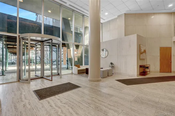 a bathroom with a tub and shower
