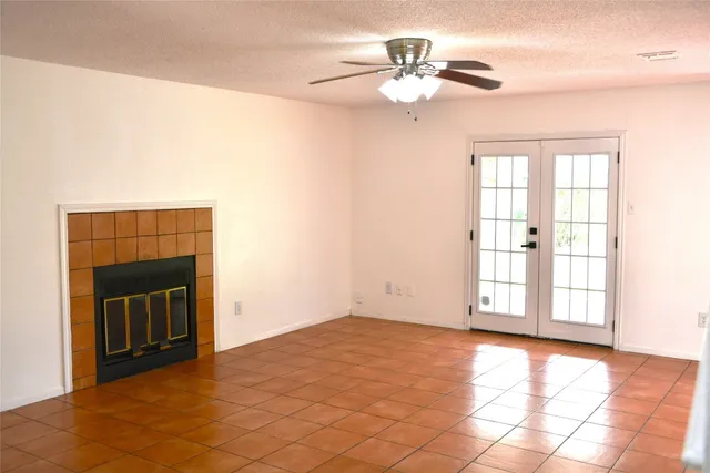 a view of an empty room with windows