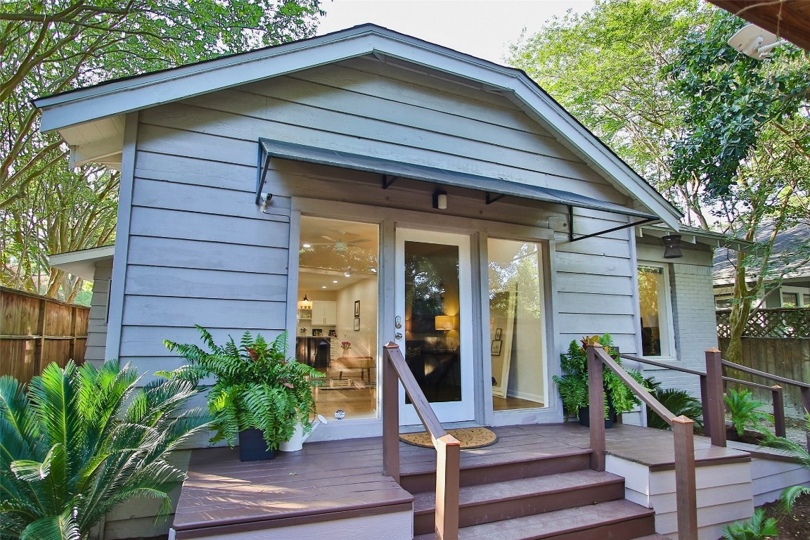 1818 Haver Street Houston, TX 77006 - Photo 1 of 28 a front view of house with wooden stairs