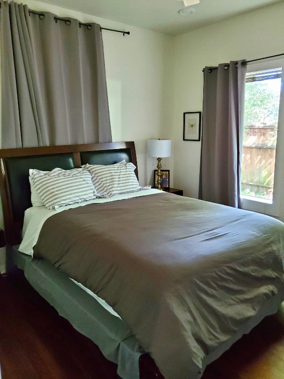 1818 Haver Street Houston, TX 77006 - Photo 19 of 28 a bed sitting in a bedroom next to a window