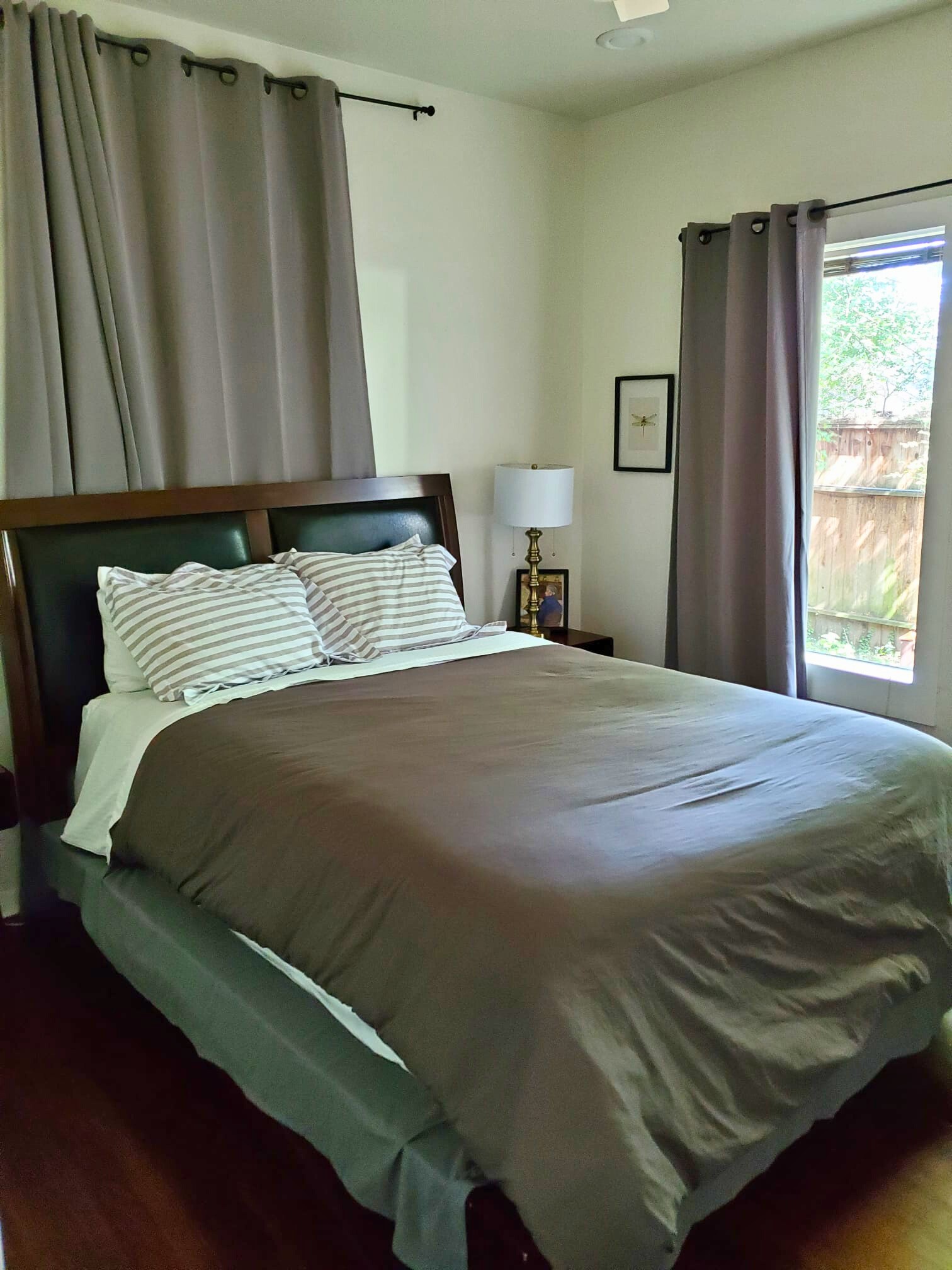 1818 Haver Street Houston, TX 77006 - Photo 19 of 28 a bedroom with a bed and window