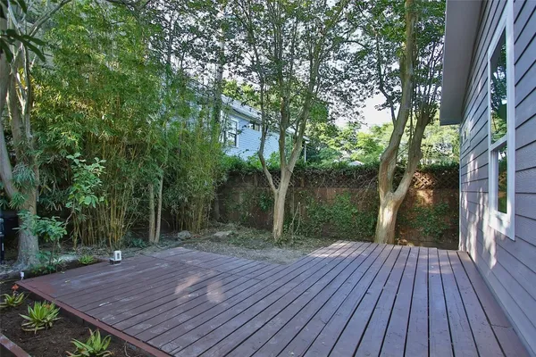 a view of backyard with green space