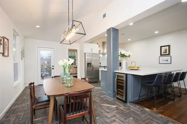 a view of a dining room with furniture