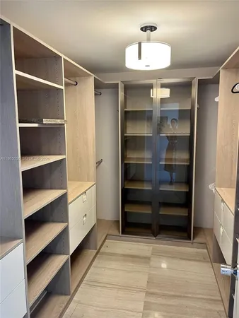 a room with storage and utility