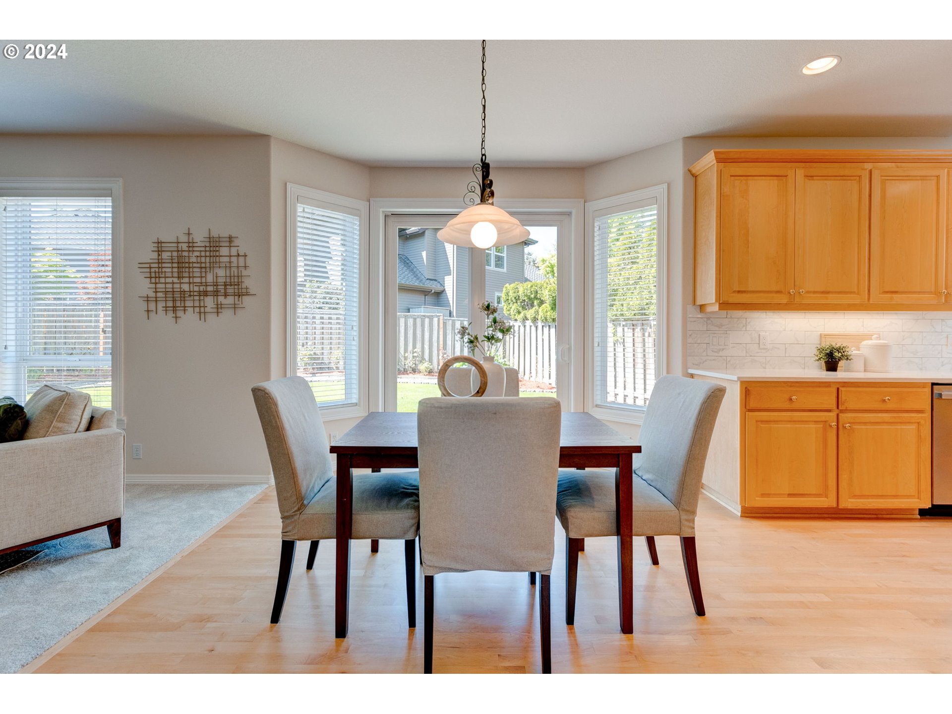 16610 Northwest Mission Oaks Drive Beaverton, OR 97006 - Photo 15 of 37 a dining room with furniture and window