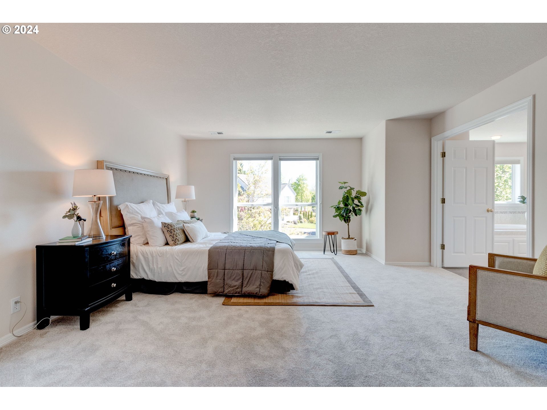 16610 Northwest Mission Oaks Drive Beaverton, OR 97006 - Photo 21 of 37 a living room with furniture and a large window