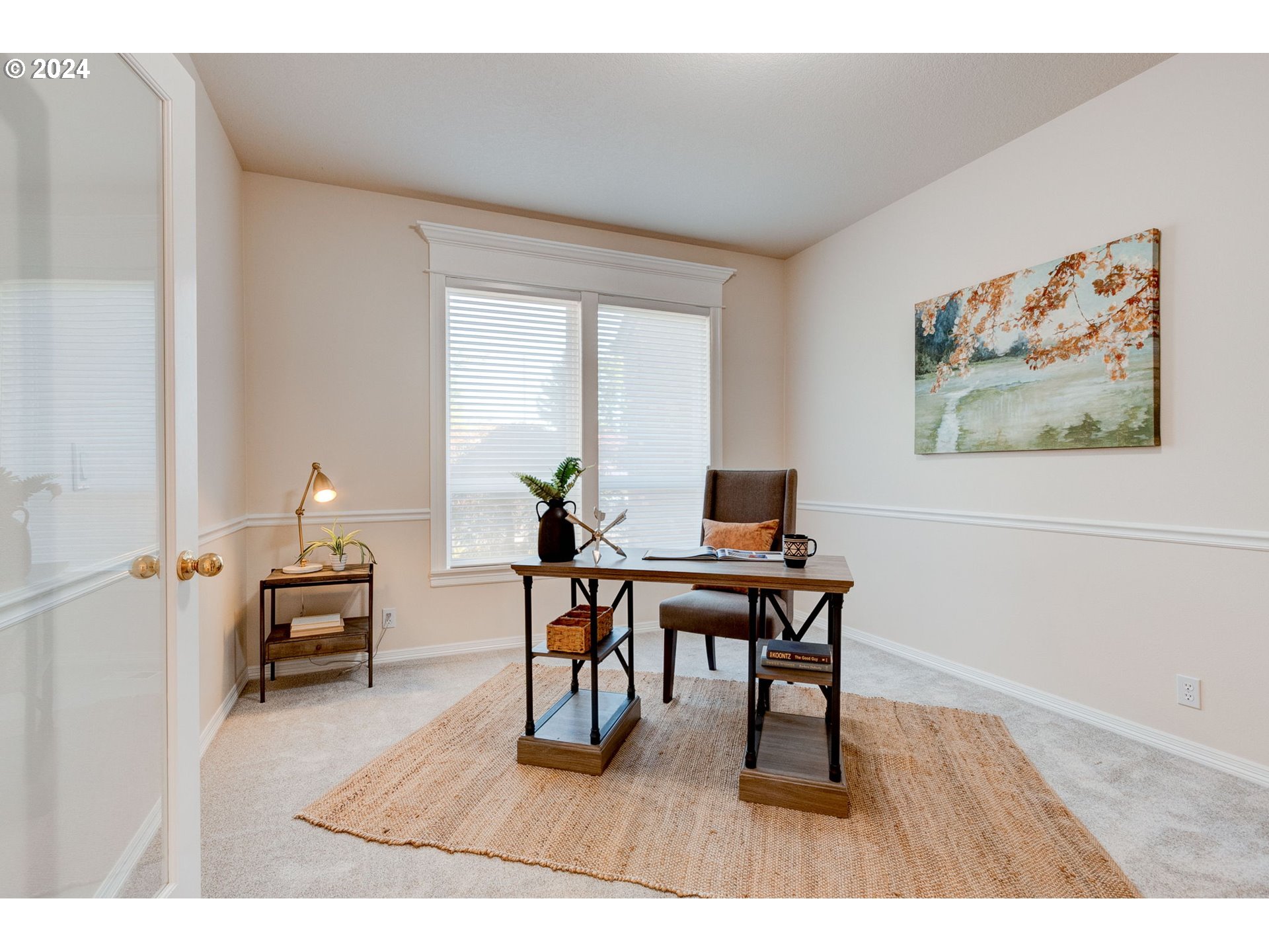 16610 Northwest Mission Oaks Drive Beaverton, OR 97006 - Photo 5 of 37 a workspace with furniture window and wooden floor