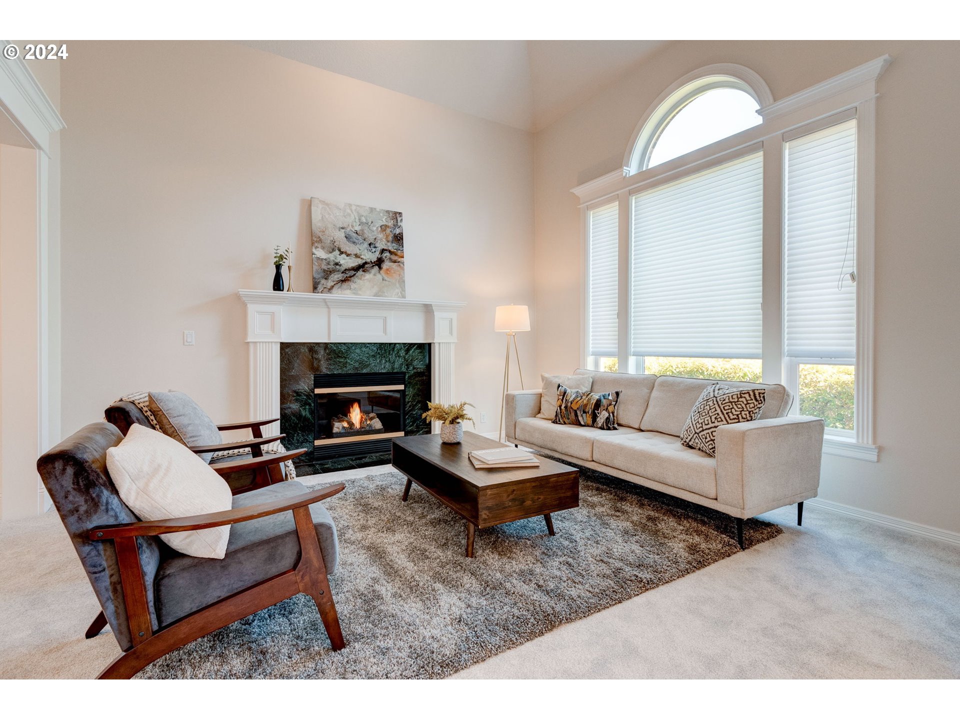16610 Northwest Mission Oaks Drive Beaverton, OR 97006 - Photo 7 of 37 a living room with furniture and a fireplace