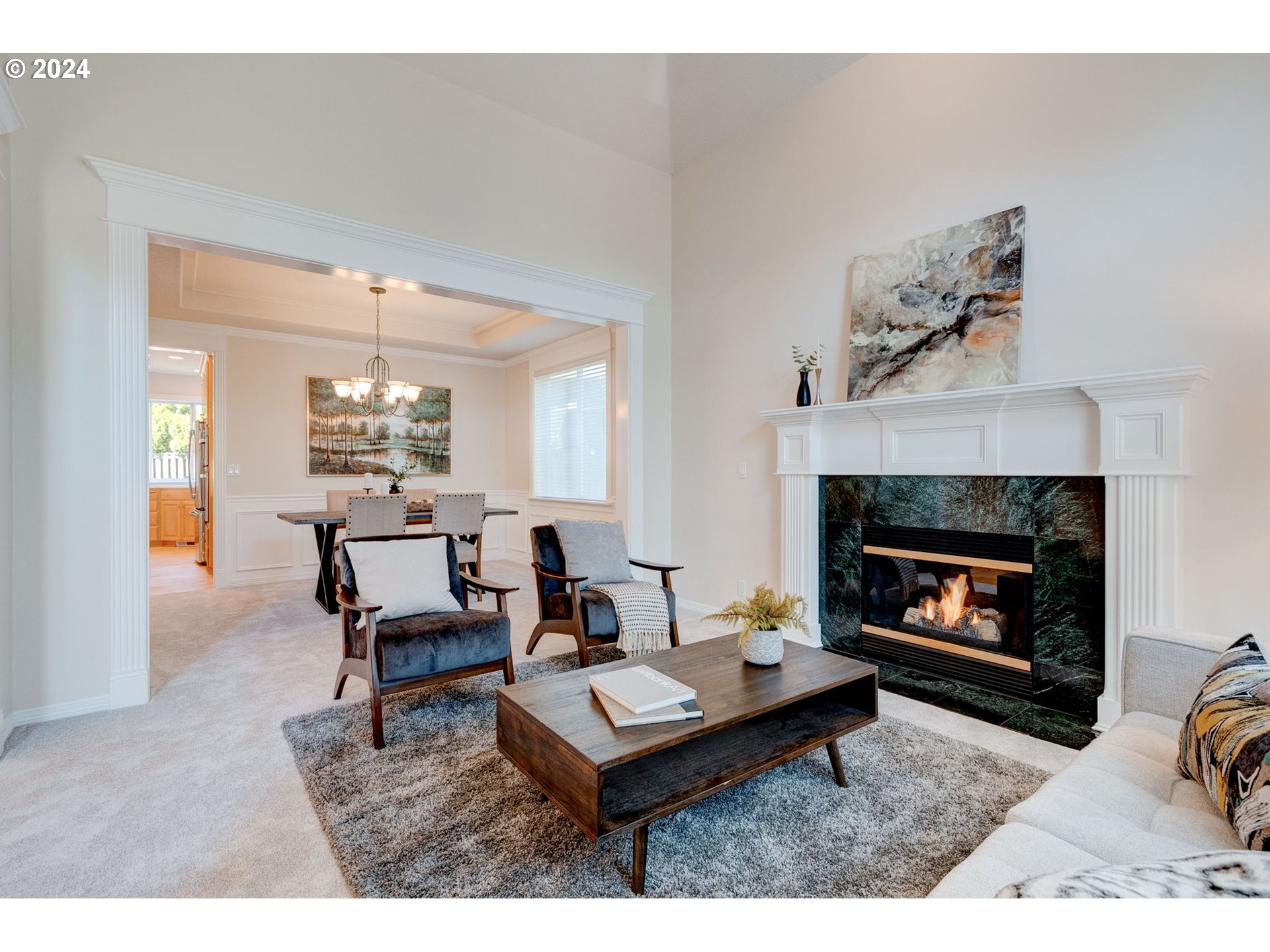 16610 Northwest Mission Oaks Drive Beaverton, OR 97006 - Photo 8 of 37 a living room with furniture and a fireplace