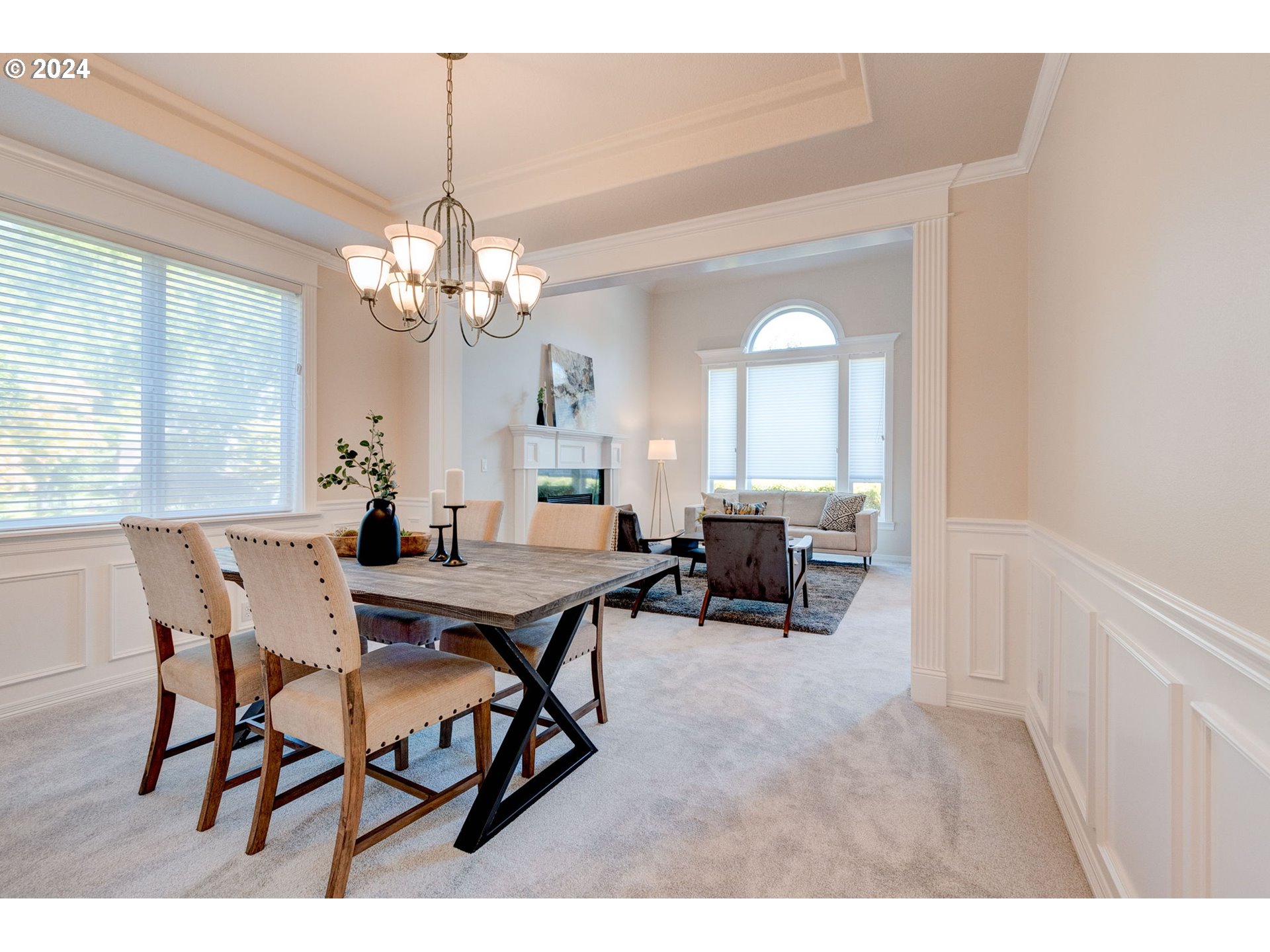 16610 Northwest Mission Oaks Drive Beaverton, OR 97006 - Photo 10 of 37 a view of a dining room with furniture and chandelier