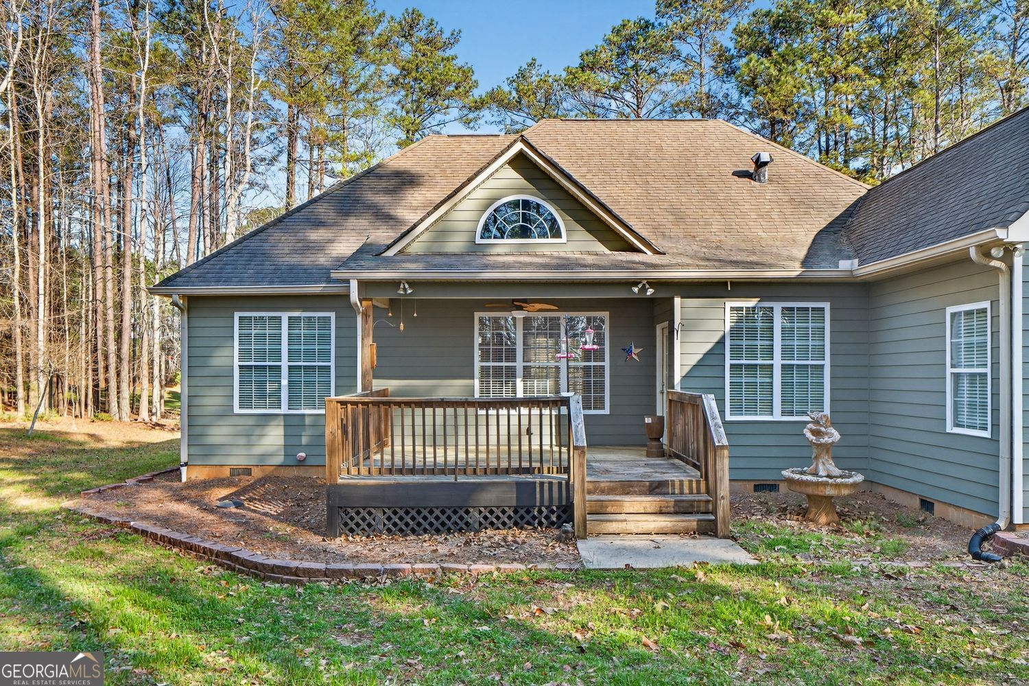 206 Jack Maddox Bridge Road Jackson, GA 30233 - Photo 30 of 38 a front view of a house with a yard