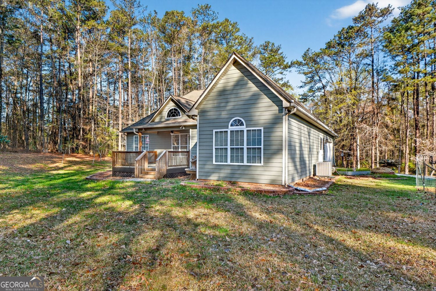 206 Jack Maddox Bridge Road Jackson, GA 30233 - Photo 31 of 38 a view of a house with a yard