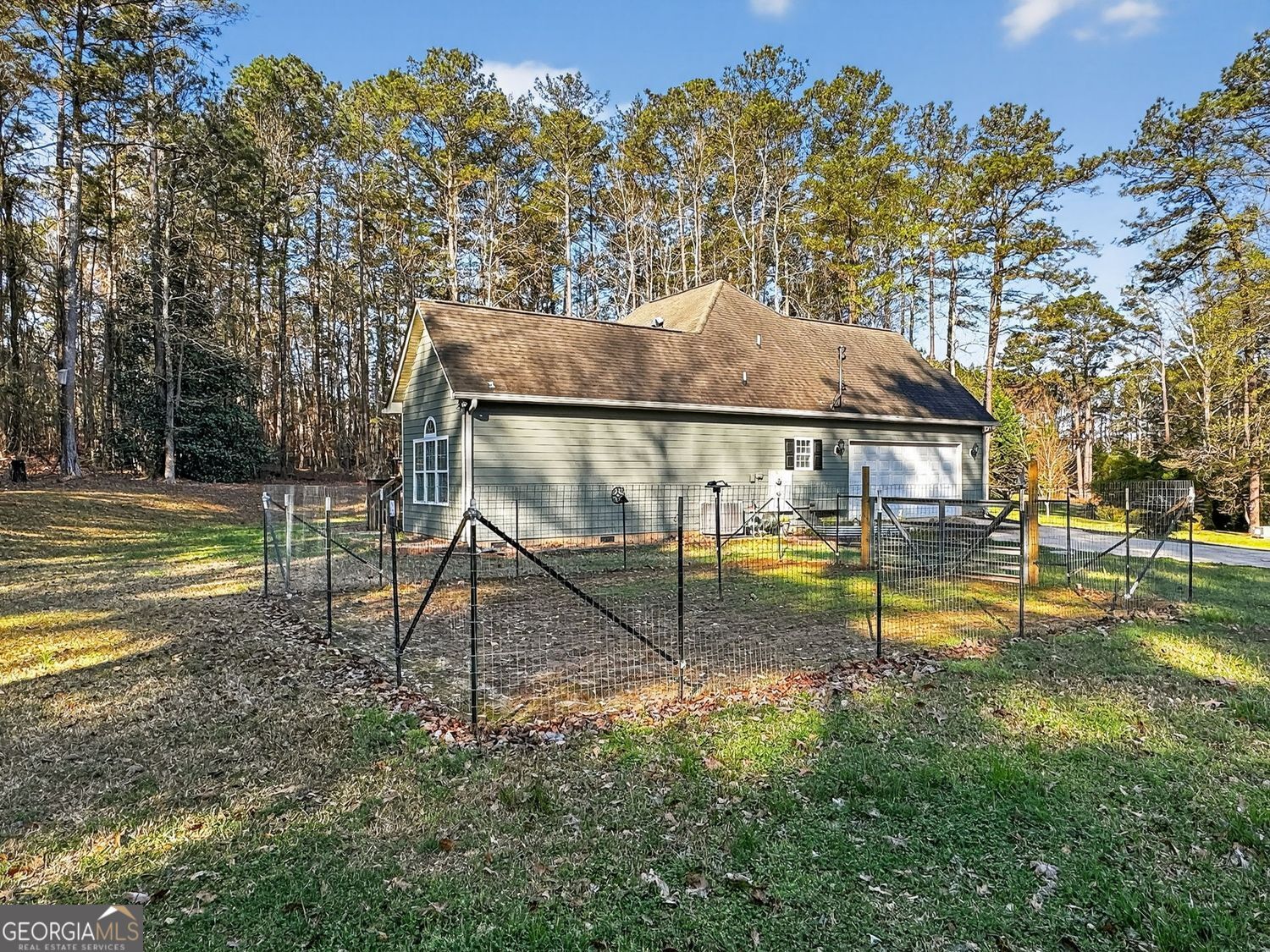 206 Jack Maddox Bridge Road Jackson, GA 30233 - Photo 35 of 38 a view of a swimming pool with a yard