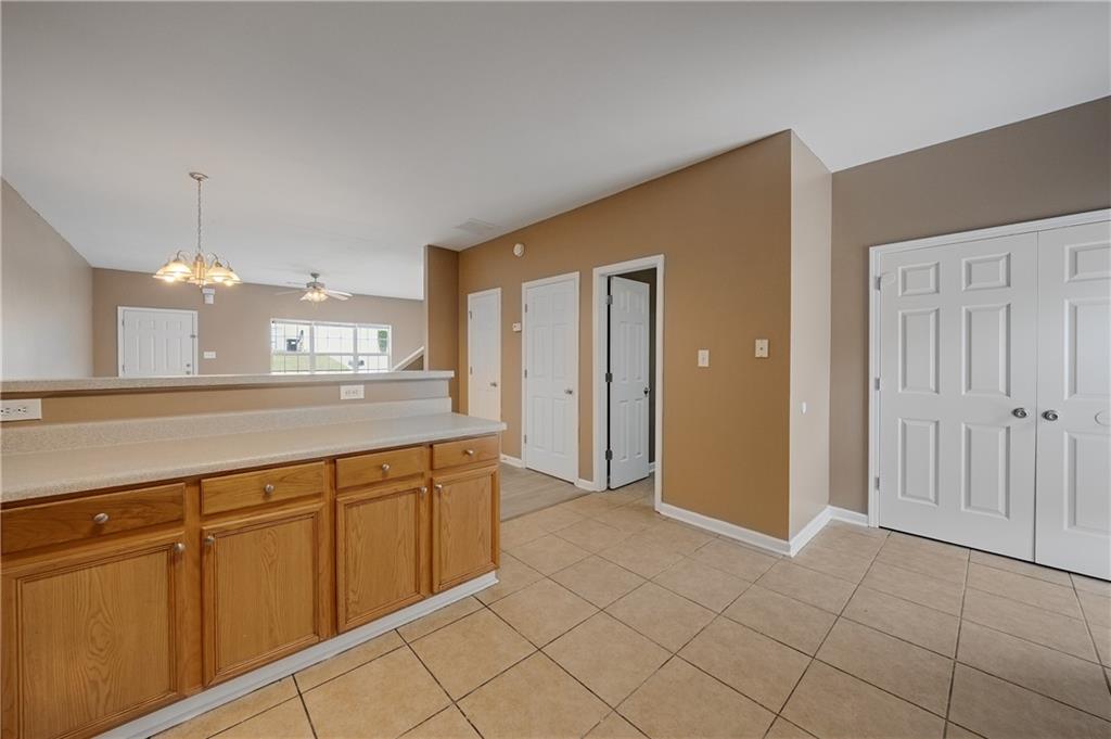 4203 Legacy Square Atlanta, GA 30349 - Photo 20 of 35 a spacious bathroom with a sink and a mirror