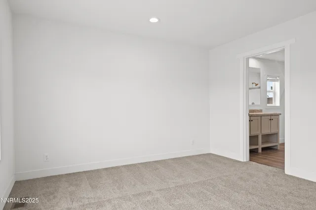 an empty room with a bathroom