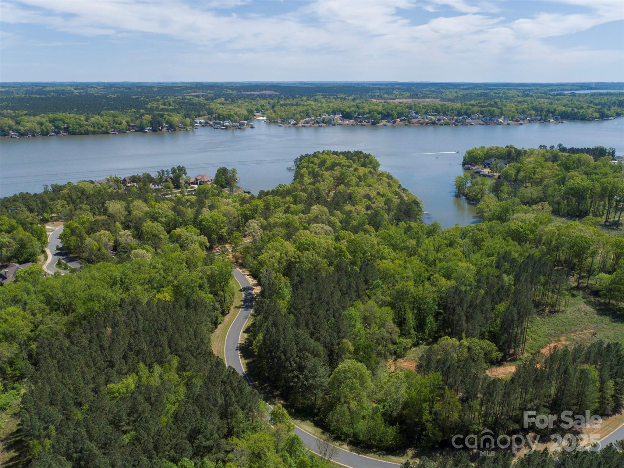 1079 Edgewater Drive, Unit NOTTINGHAM Albemarle, NC 28001 - Photo 24 of 27 an aerial view of ocean with residential house and outdoor space