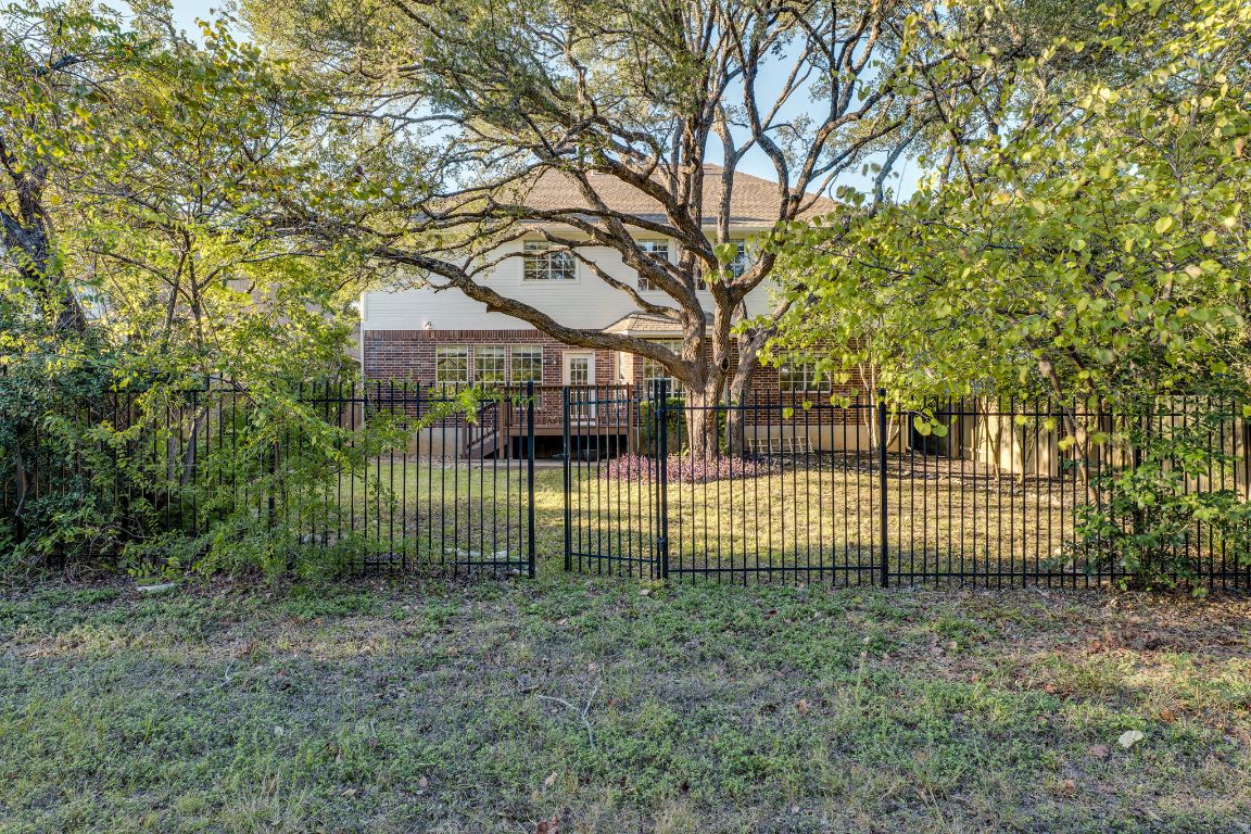 10701 Redmond Road Austin, TX 78739 - Photo 38 of 39 a view of a yard with large trees