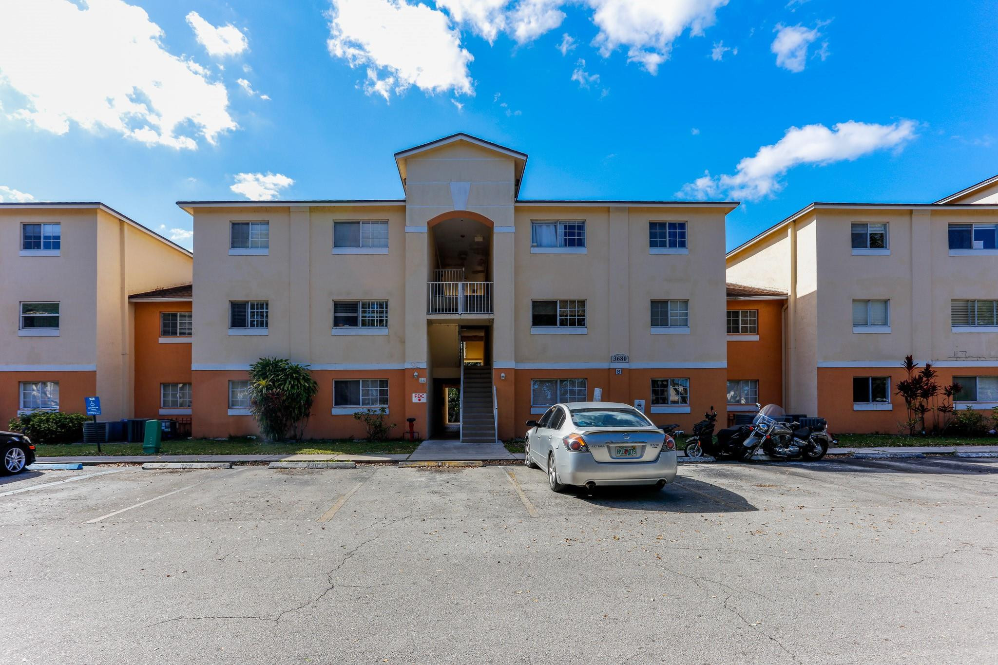 a cars parked in front of a building