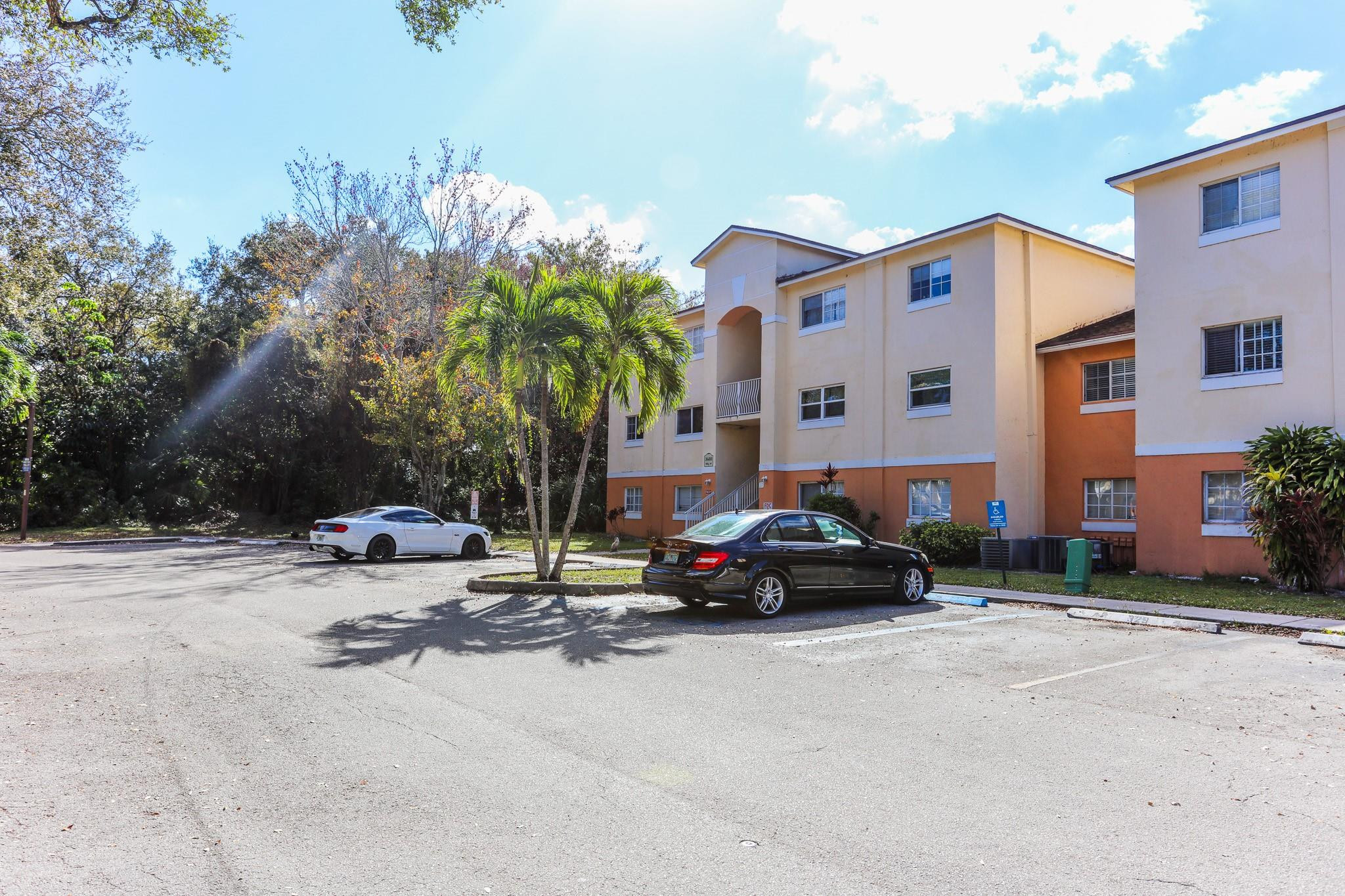 3680 North 56th Avenue, Unit 806 Hollywood, FL 33021 - Photo 16 of 30 a car parked in front of a house