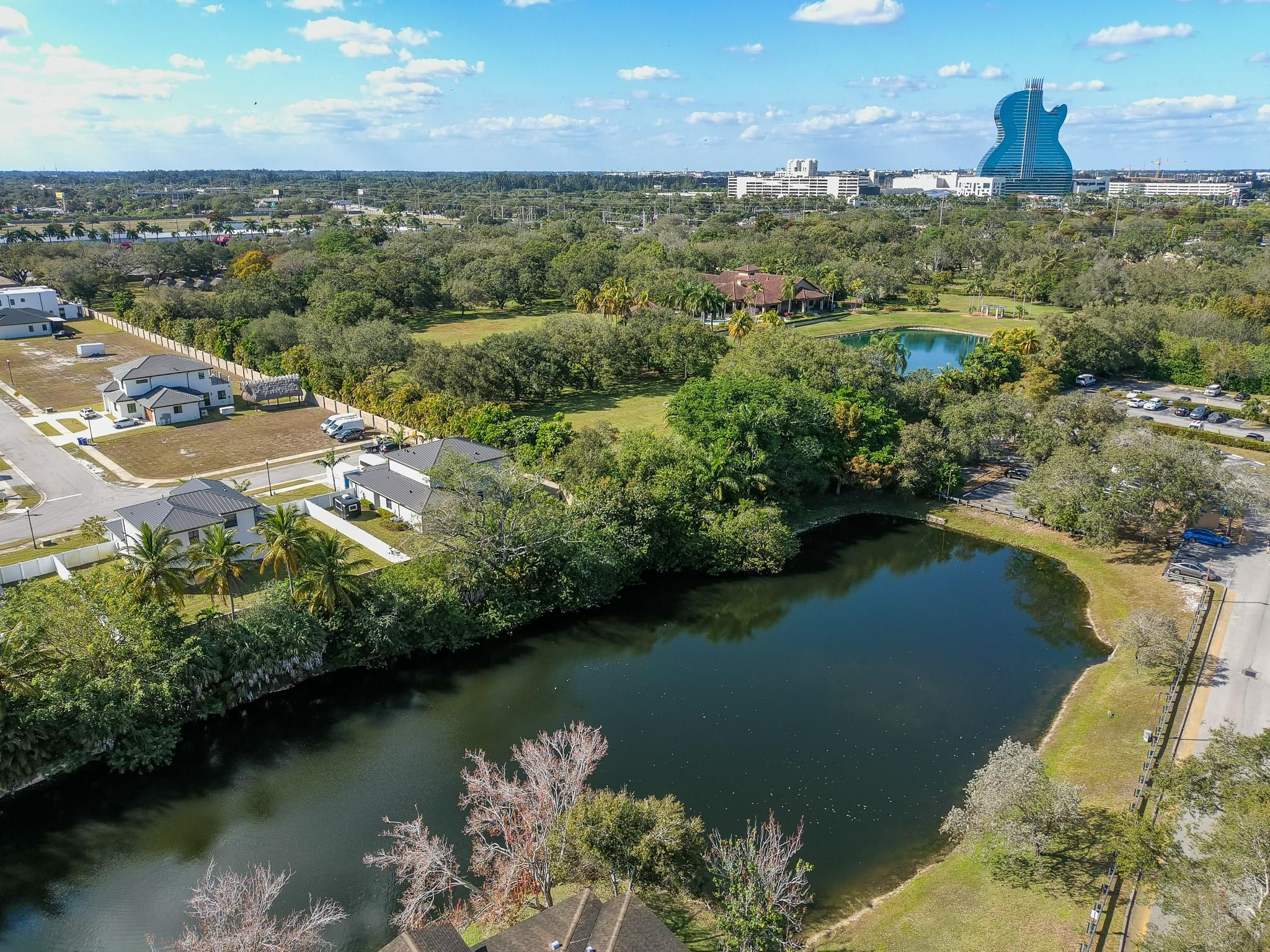 3680 North 56th Avenue, Unit 806 Hollywood, FL 33021 - Photo 22 of 30 an aerial view of a houses with a lake view