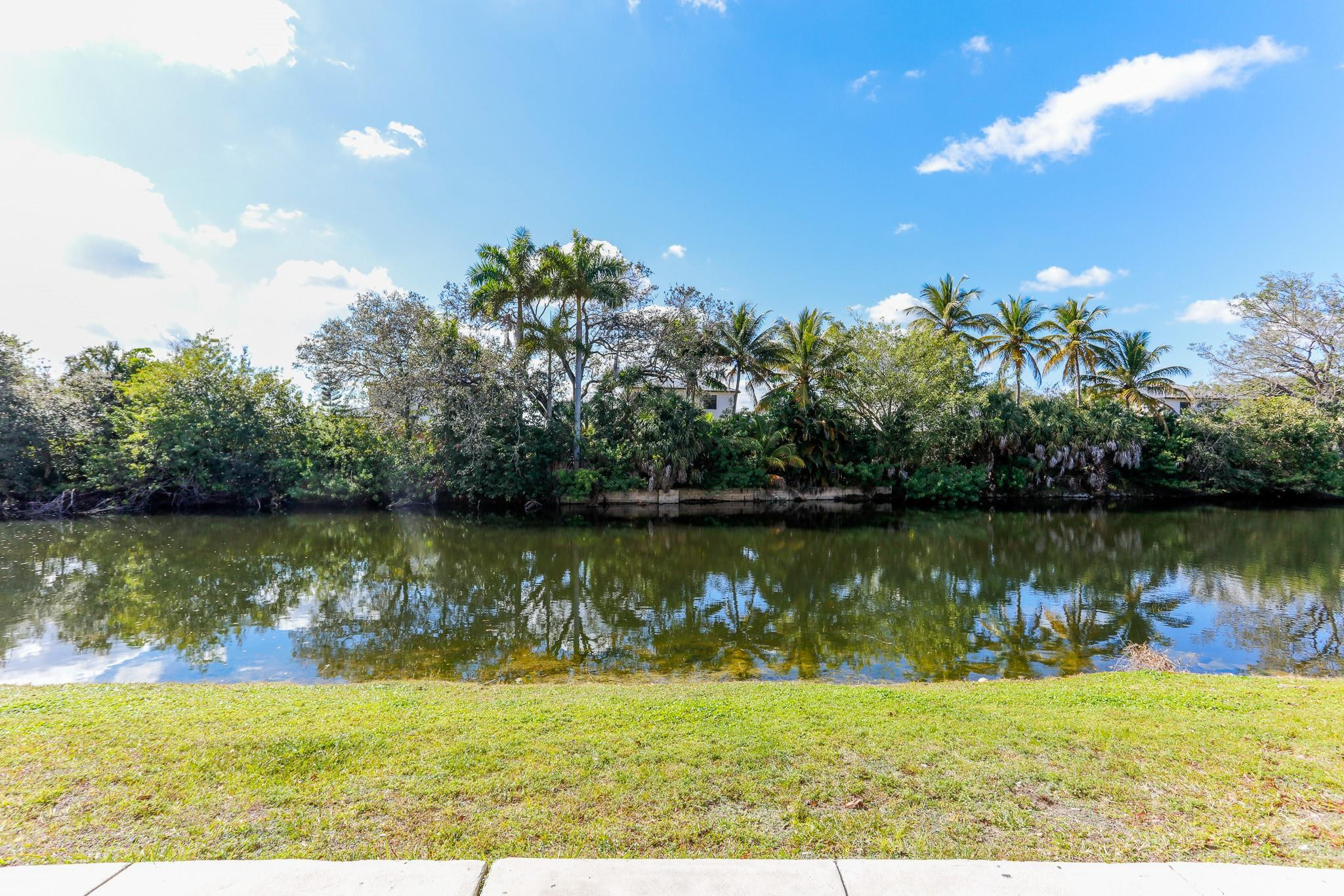 3680 North 56th Avenue, Unit 806 Hollywood, FL 33021 - Photo 4 of 30 a view of a lake with a yard