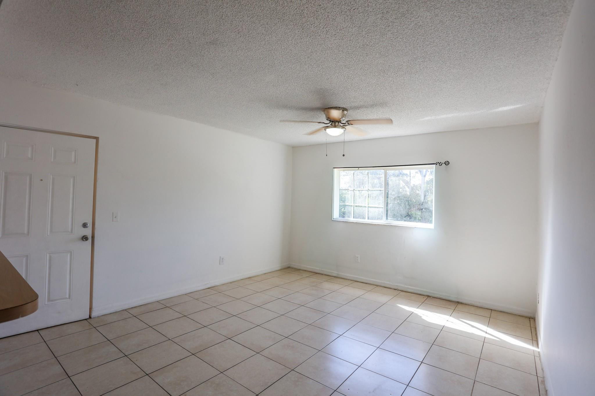 3680 North 56th Avenue, Unit 806 Hollywood, FL 33021 - Photo 6 of 30 a view of an empty room with a window
