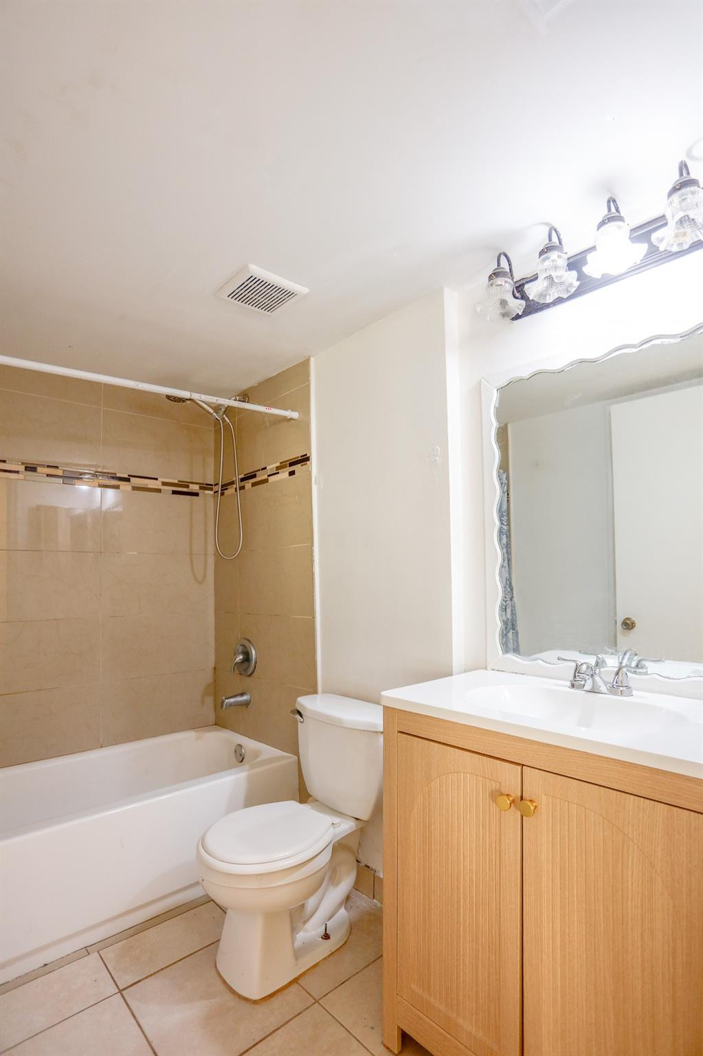 3680 North 56th Avenue, Unit 806 Hollywood, FL 33021 - Photo 10 of 30 a bathroom with a sink a toilet and shower