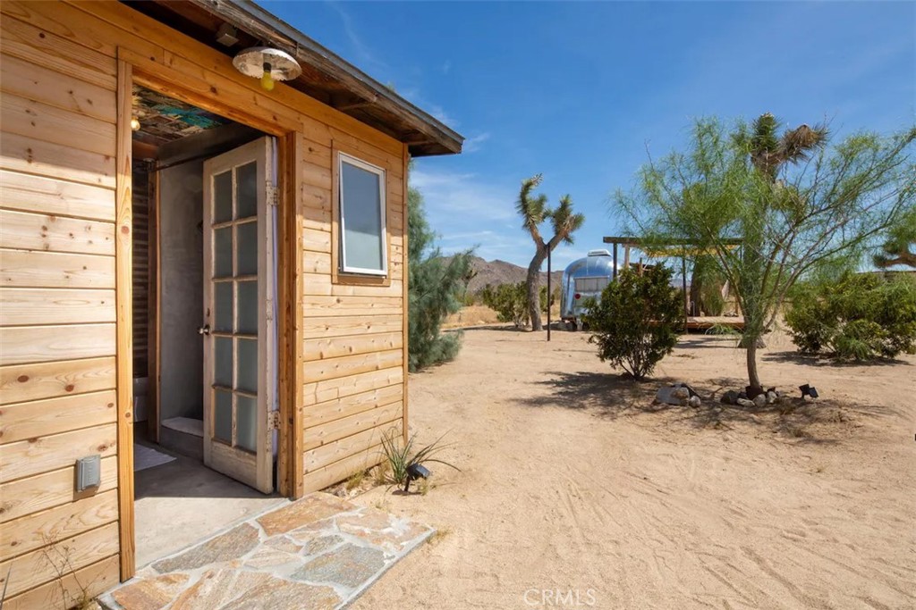 3535 Olympic Road Joshua Tree, CA 92252 - Photo 56 of 63 a view of a backyard of the house