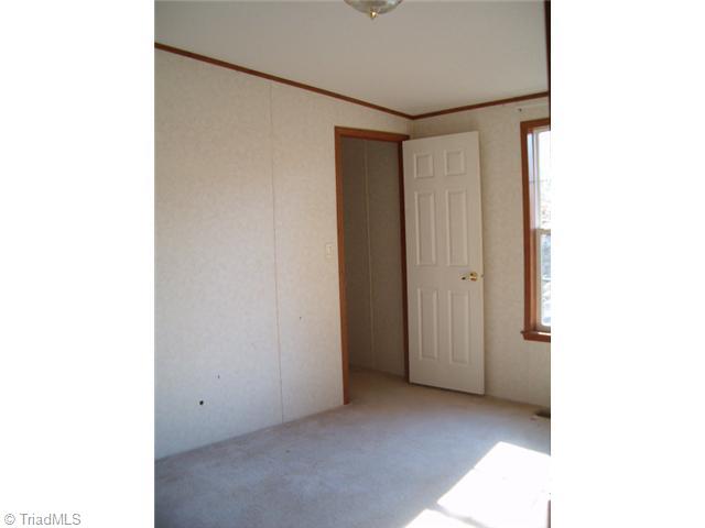5679 Whites Chapel Road Staley, NC 27355 - Photo 2 of 5 2nd Bedroom.