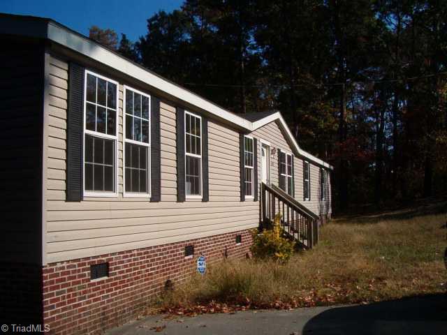 5679 Whites Chapel Road Staley, NC 27355 - Photo 3 of 5 Exterior Front.