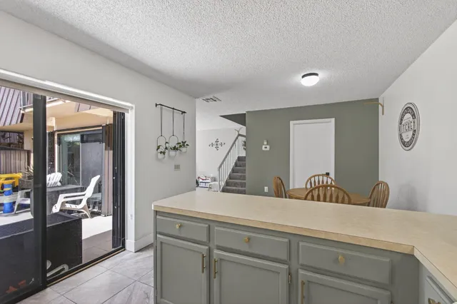 a view of bathroom with a sink toilet and wooden floor