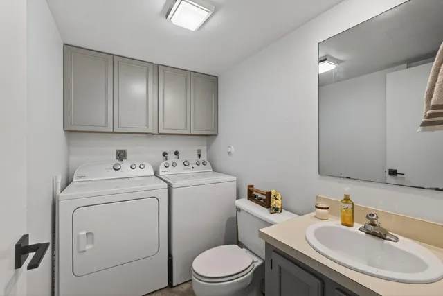 a large white bed in a white room