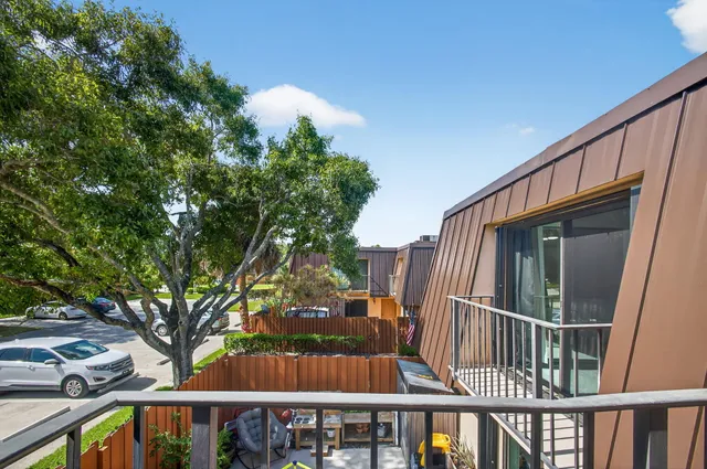 a bathroom with a bathtub and a shower curtain