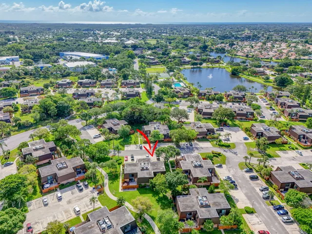 an aerial view of a house with a garden