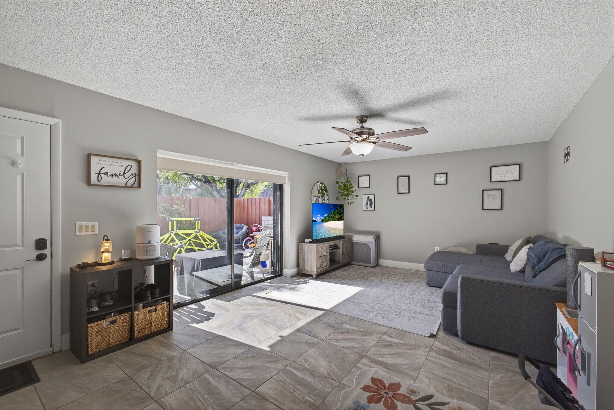 5680 Southeast Windsong Lane, Unit 345 Stuart, FL 34997 - Photo 8 of 54 a living room with furniture