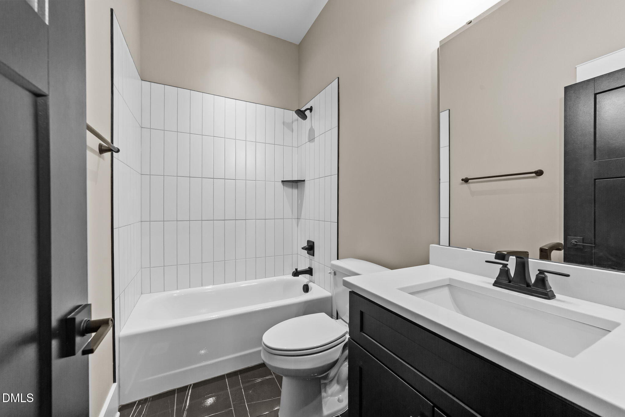 2590 Lassiter Road Four Oaks, NC 27524 - Photo 26 of 55 a bathroom with a sink a toilet and shower